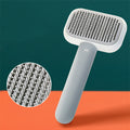 Grey self-cleaning slicker brush with stainless steel pins