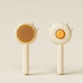 Yellow self-cleaning cat slicker brush, front and back